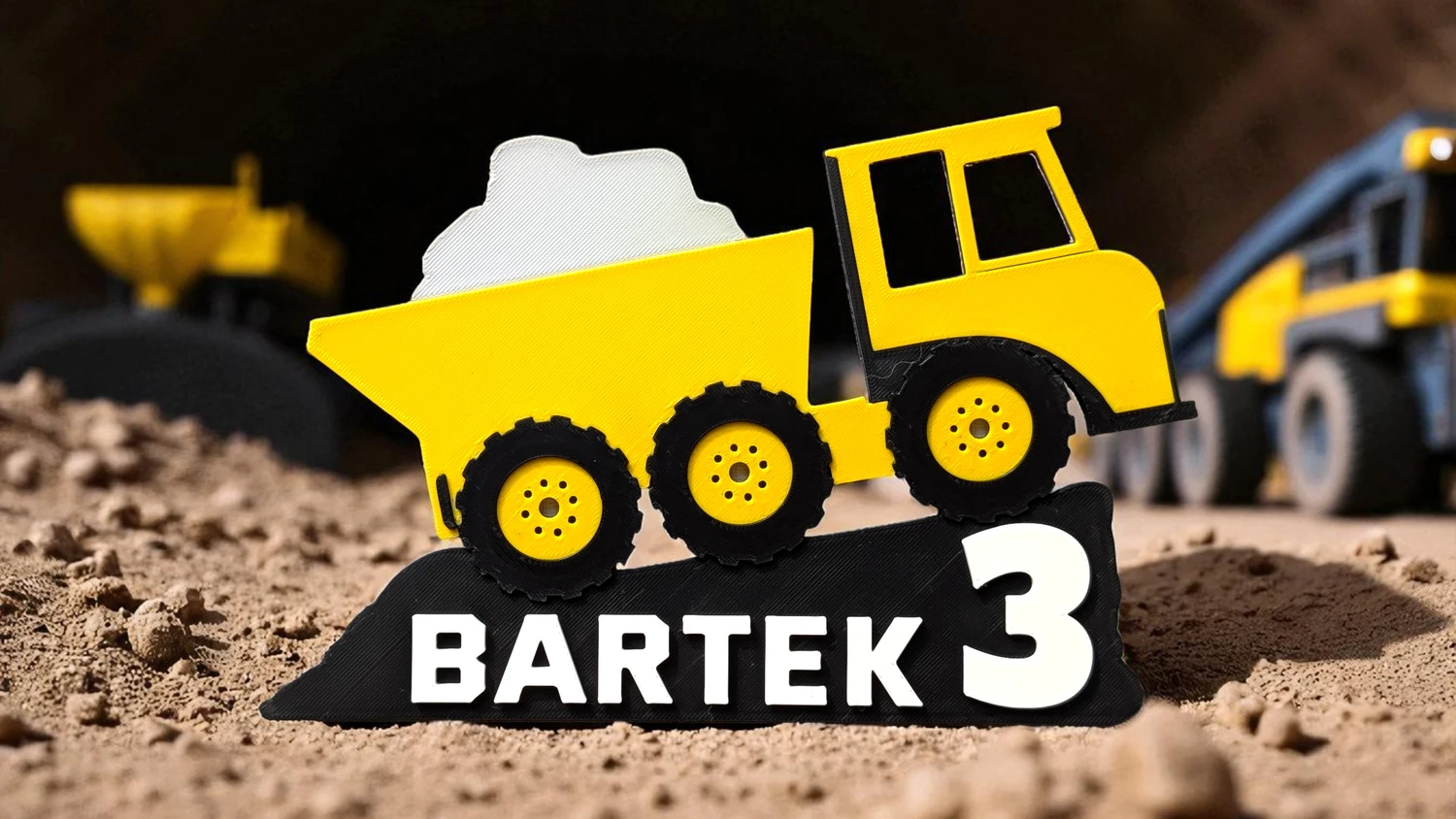 Topper wywrotka z szarym ładunkiem 3D – detale kół i kabiny ciężarówki na tort