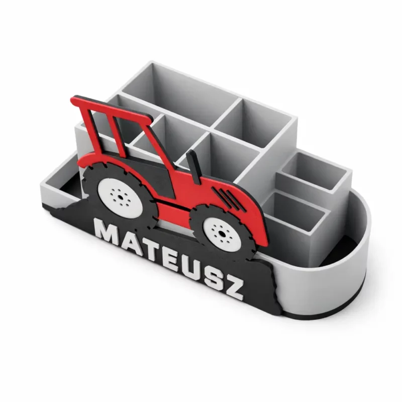 Organizer na biurko traktor widziany pod kątem. Zdjęcie pokazuje układ dziewięciu pustych przegródek gotowych na przybory dziecka.