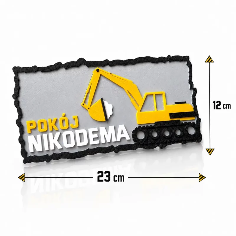 Tabliczka na drzwi z imieniem koparka o wymiarach 23 cm szerokości i 12 cm wysokości